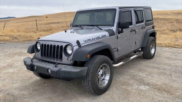 used 2014 Jeep Wrangler Unlimited car, priced at $16,653