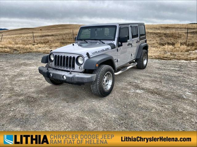 used 2014 Jeep Wrangler Unlimited car, priced at $18,130