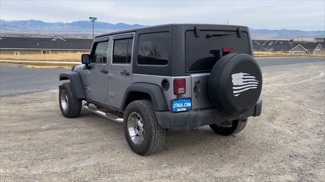 used 2014 Jeep Wrangler Unlimited car, priced at $16,653