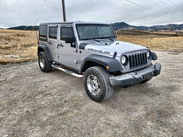 used 2014 Jeep Wrangler Unlimited car, priced at $18,130