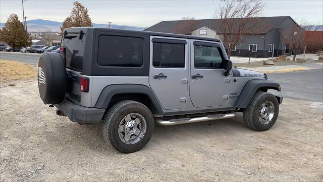 used 2014 Jeep Wrangler Unlimited car, priced at $16,653