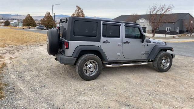 used 2014 Jeep Wrangler Unlimited car, priced at $17,907