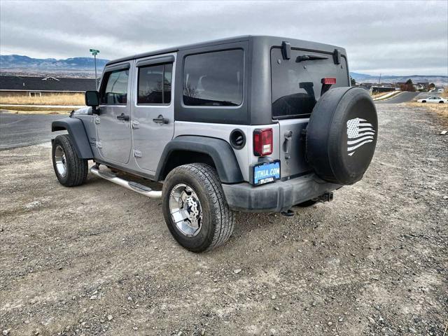 used 2014 Jeep Wrangler Unlimited car, priced at $18,130