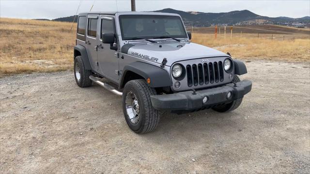 used 2014 Jeep Wrangler Unlimited car, priced at $17,907