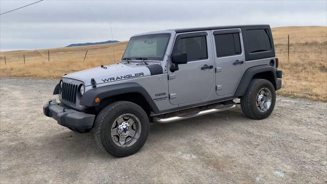 used 2014 Jeep Wrangler Unlimited car, priced at $16,653