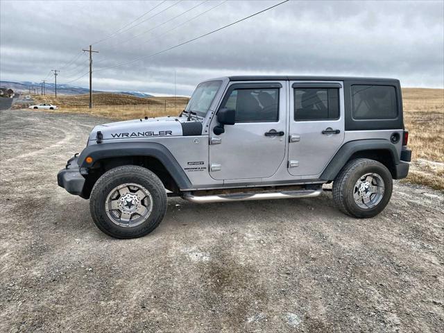 used 2014 Jeep Wrangler Unlimited car, priced at $18,130