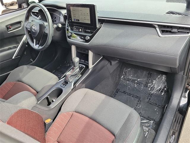 used 2025 Toyota Corolla Cross Hybrid car, priced at $30,589