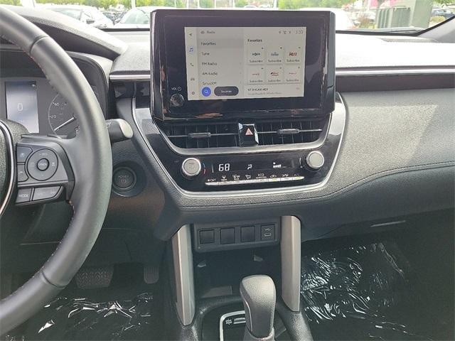 used 2025 Toyota Corolla Cross Hybrid car, priced at $30,589