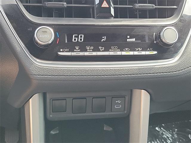 used 2025 Toyota Corolla Cross Hybrid car, priced at $30,589