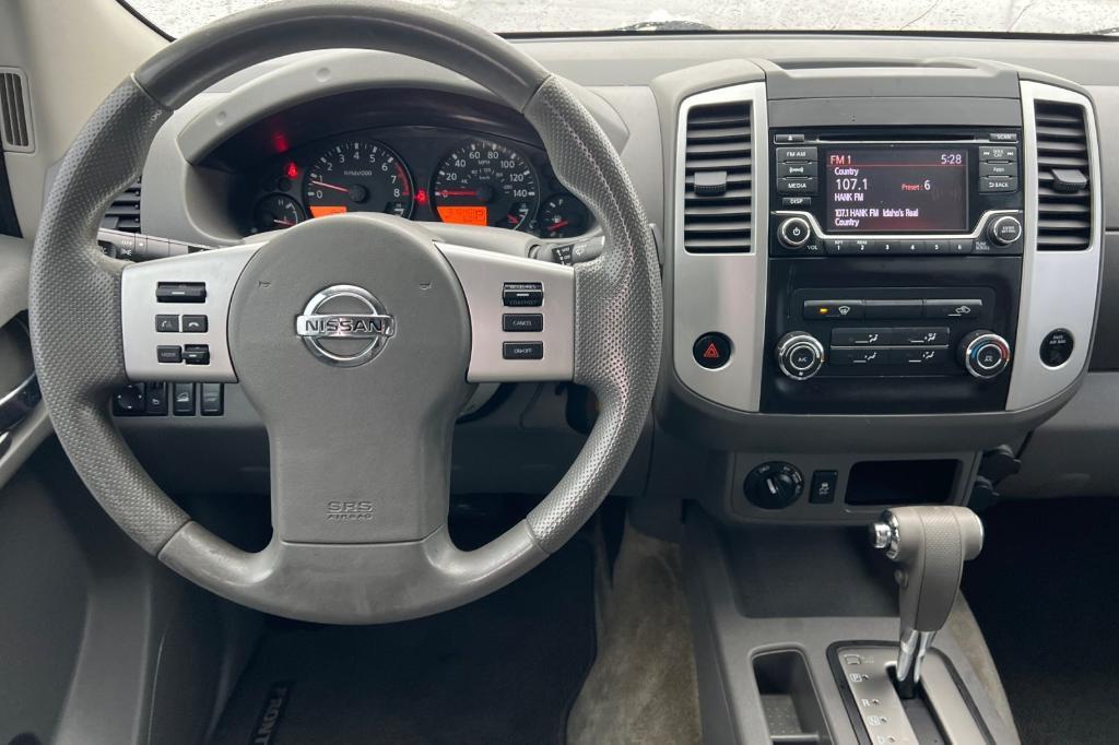 used 2015 Nissan Frontier car, priced at $18,000