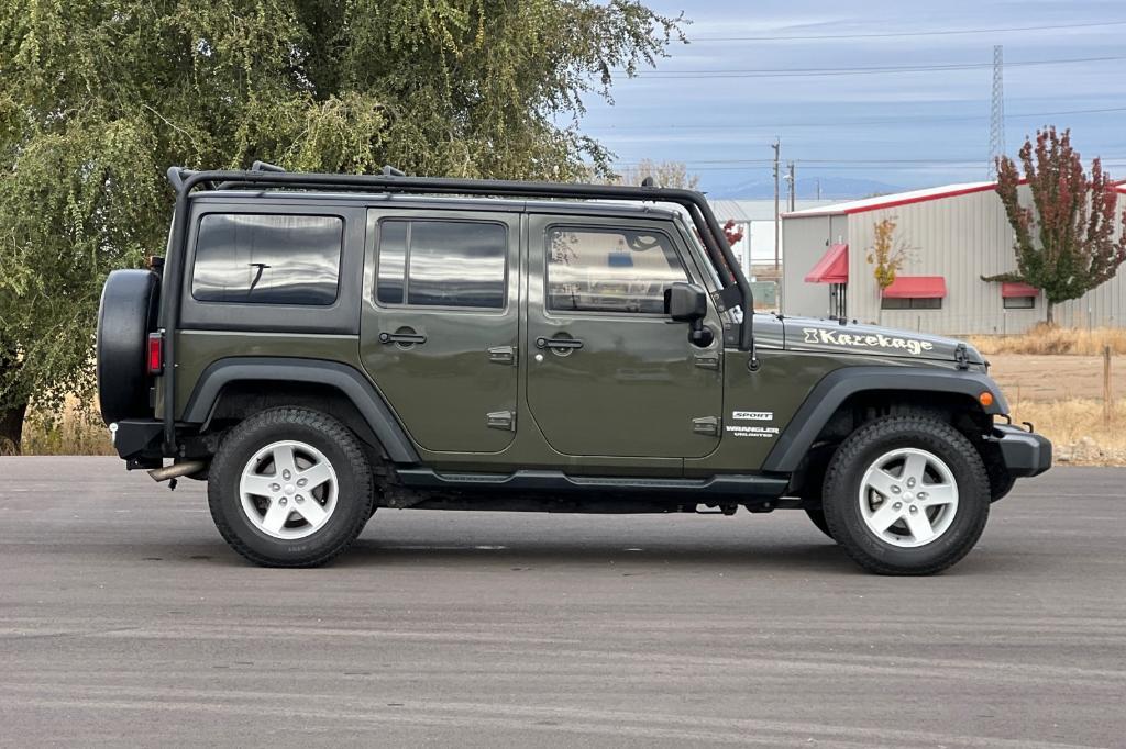 used 2016 Jeep Wrangler Unlimited car, priced at $25,753