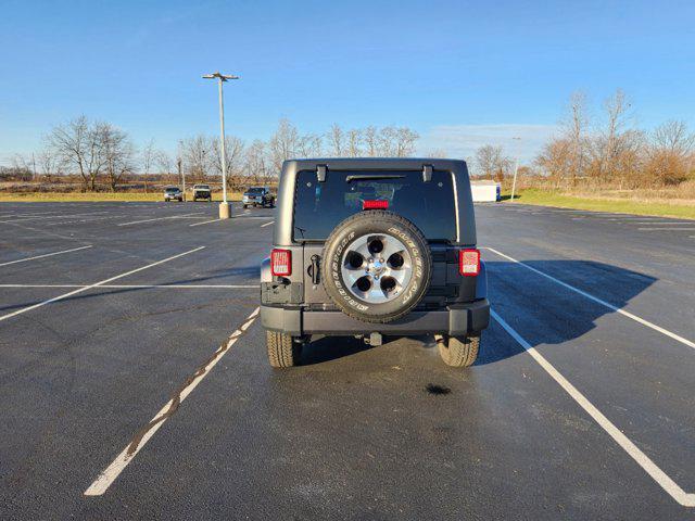 used 2018 Jeep Wrangler JK Unlimited car, priced at $23,850