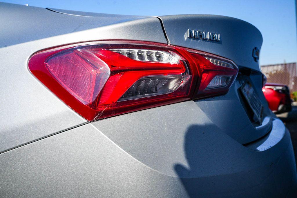 used 2021 Chevrolet Malibu car, priced at $14,228