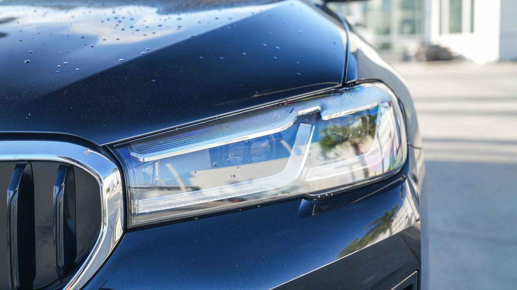 used 2023 BMW 530e car, priced at $29,338