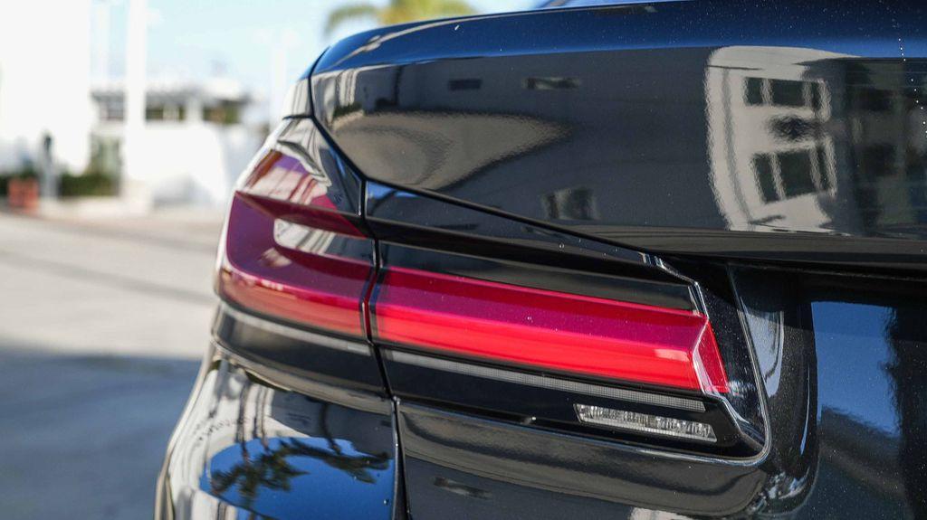 used 2023 BMW 530e car, priced at $29,338