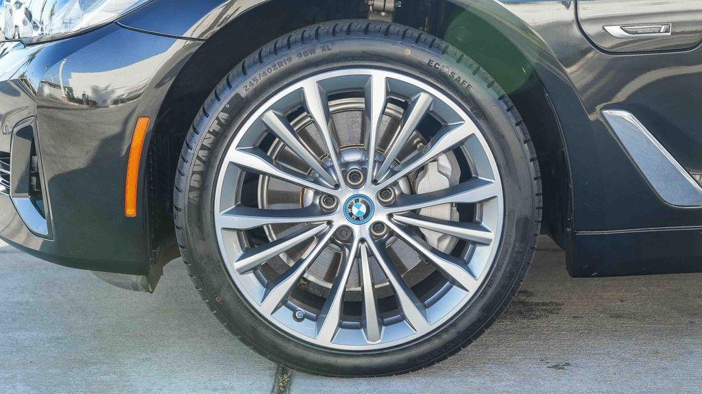 used 2023 BMW 530e car, priced at $29,338