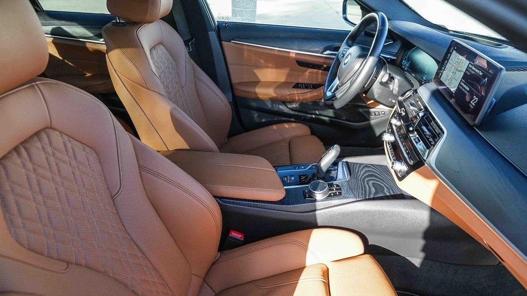 used 2023 BMW 530e car, priced at $29,338