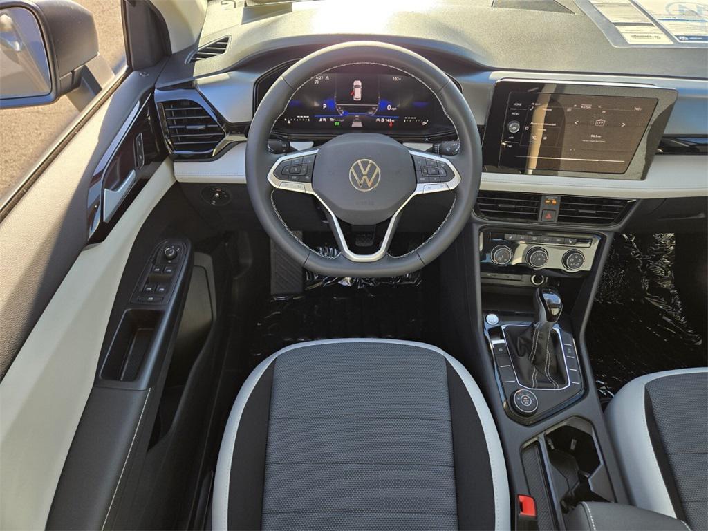 new 2025 Volkswagen Taos car, priced at $27,159