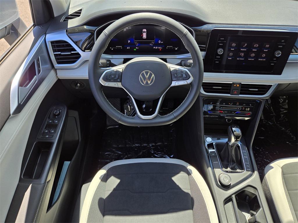 new 2025 Volkswagen Taos car, priced at $29,105