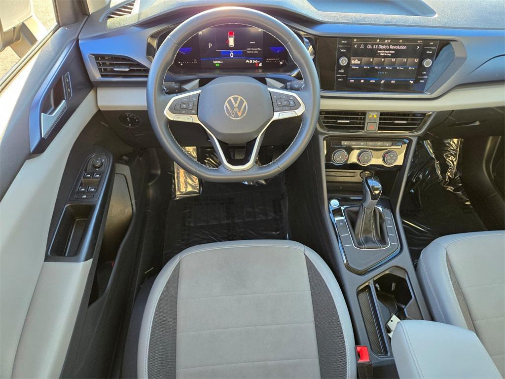 used 2023 Volkswagen Taos car, priced at $18,687