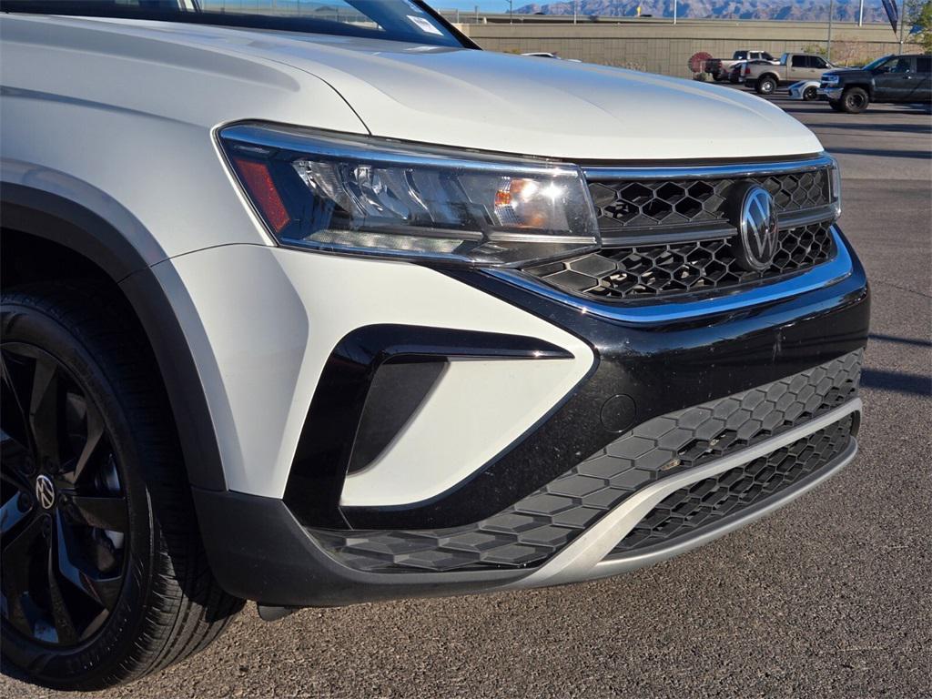 used 2023 Volkswagen Taos car, priced at $18,687