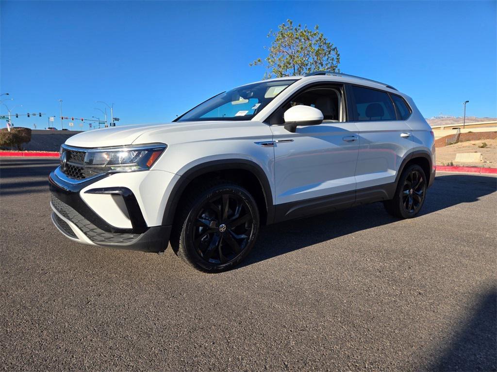 used 2023 Volkswagen Taos car, priced at $18,687