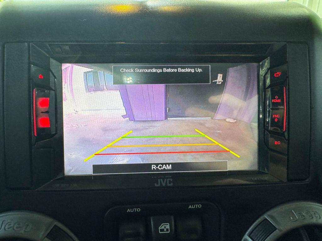 used 2014 Jeep Wrangler Unlimited car, priced at $18,820