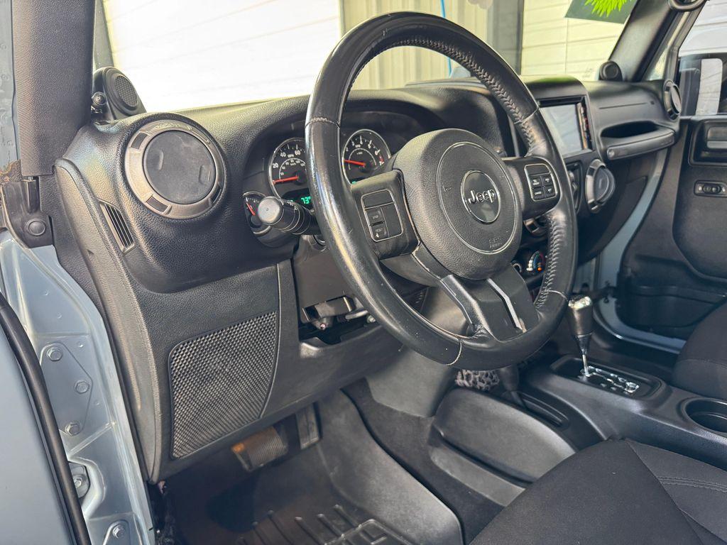 used 2014 Jeep Wrangler Unlimited car, priced at $18,820