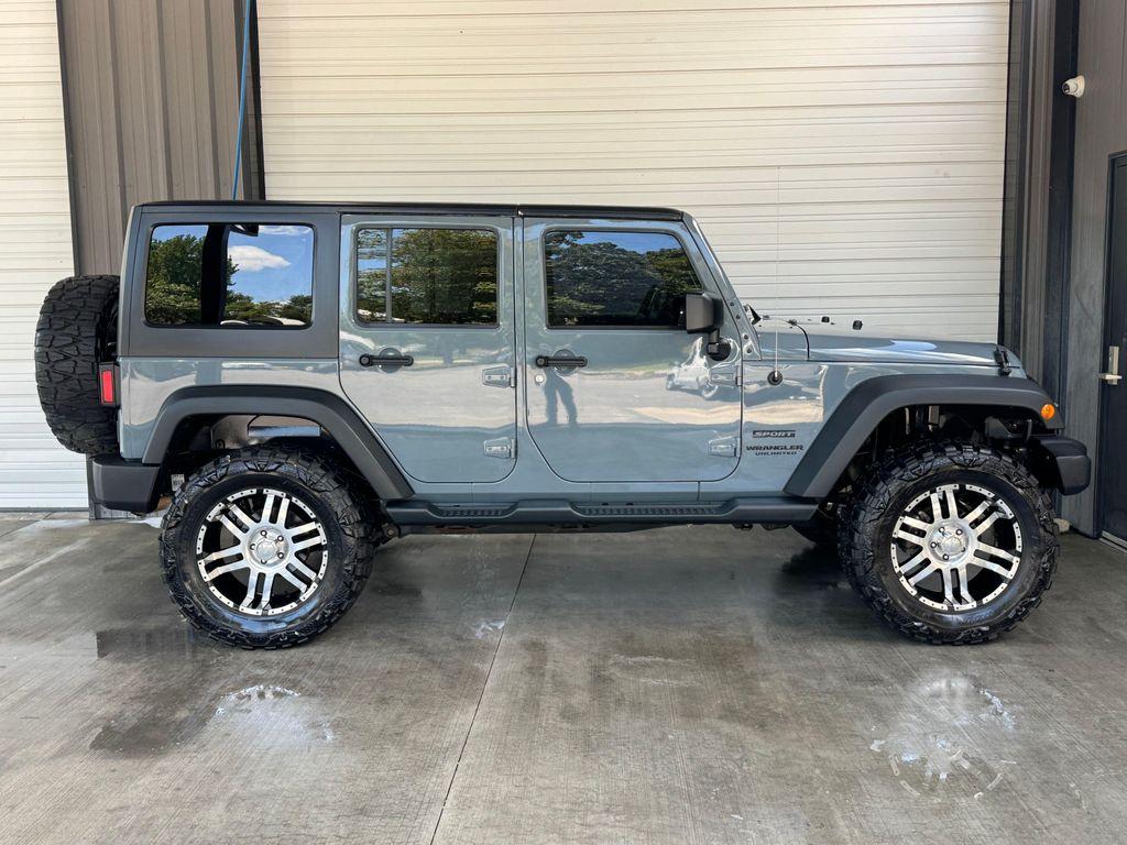 used 2014 Jeep Wrangler Unlimited car, priced at $18,820