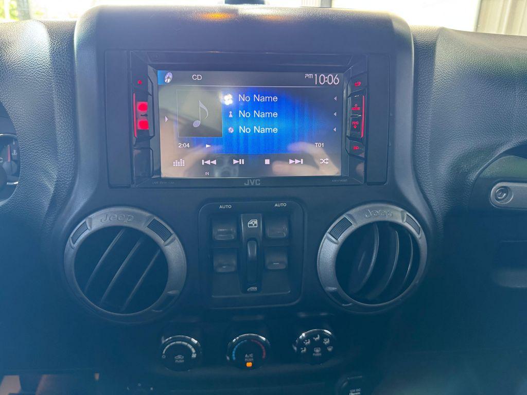 used 2014 Jeep Wrangler Unlimited car, priced at $18,820