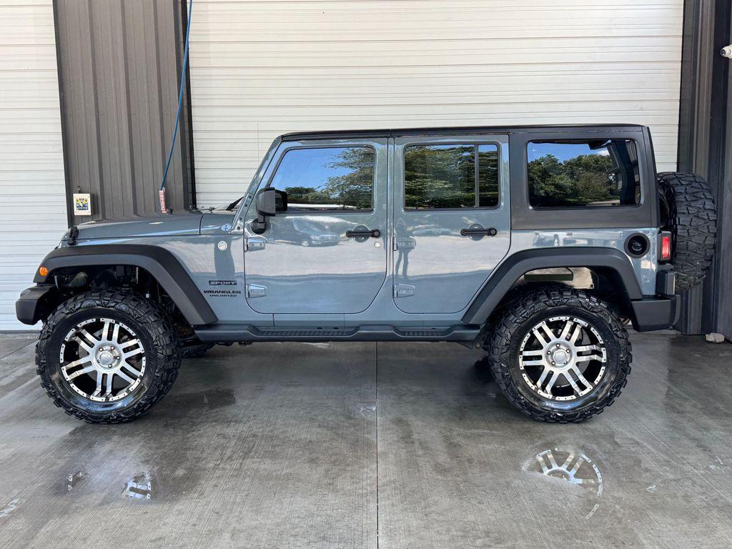 used 2014 Jeep Wrangler Unlimited car, priced at $18,820