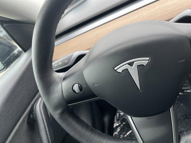 used 2021 Tesla Model Y car, priced at $28,500