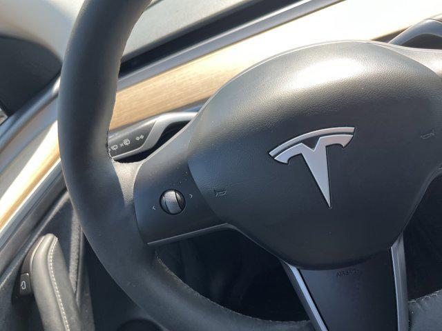 used 2023 Tesla Model Y car, priced at $29,800