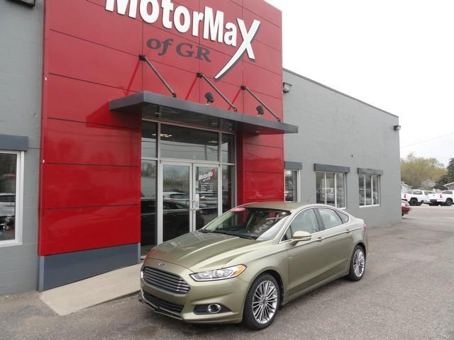 used 2013 Ford Fusion car, priced at $6,875