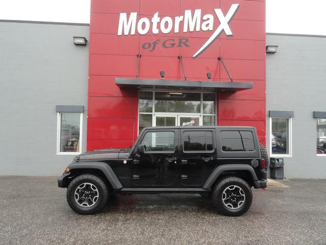 used 2014 Jeep Wrangler Unlimited car, priced at $20,455