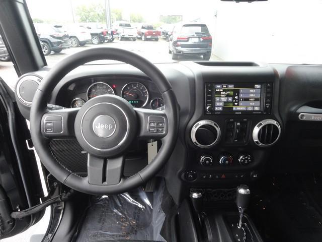 used 2015 Jeep Wrangler Unlimited car, priced at $14,675