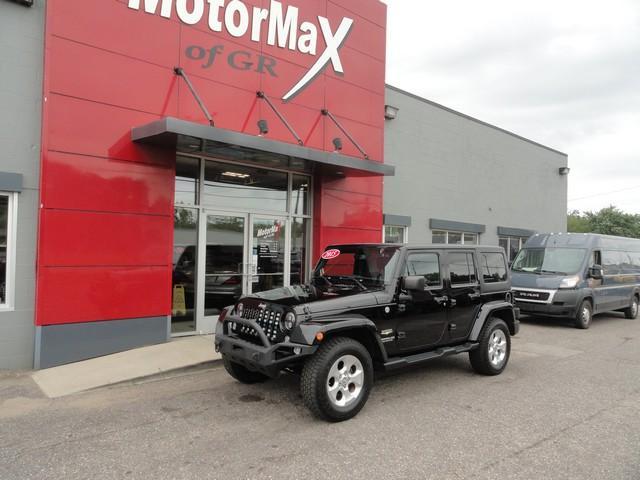 used 2015 Jeep Wrangler Unlimited car, priced at $19,875
