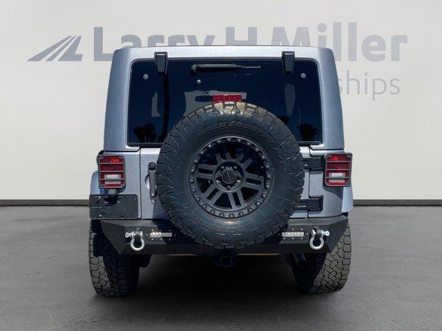 used 2016 Jeep Wrangler Unlimited car, priced at $19,494