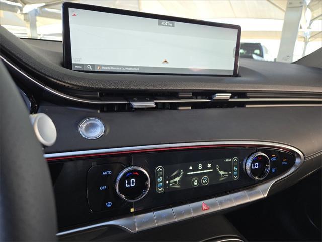 used 2024 Genesis GV70 car, priced at $50,910