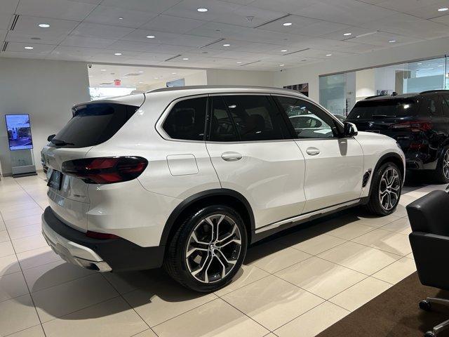 used 2025 BMW X5 car, priced at $69,999