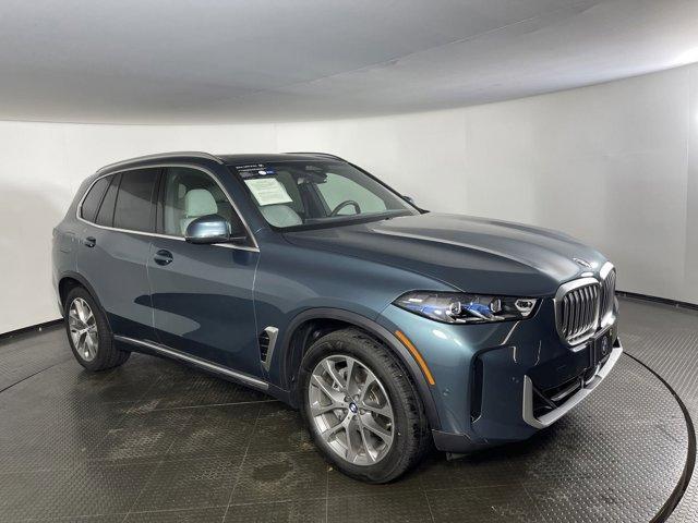 used 2024 BMW X5 car, priced at $68,850