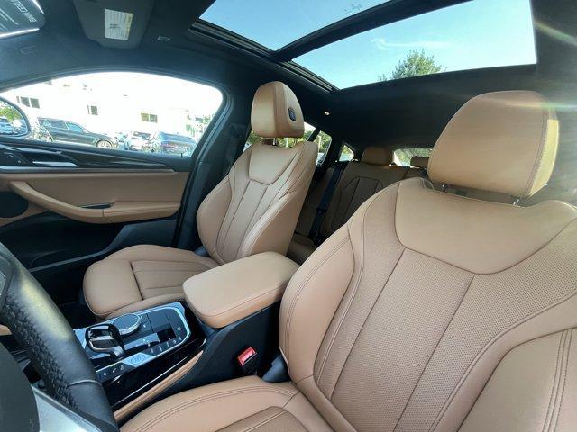 used 2025 BMW X4 car, priced at $52,999