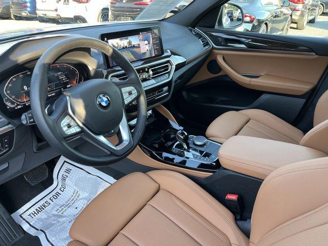 used 2025 BMW X4 car, priced at $52,999