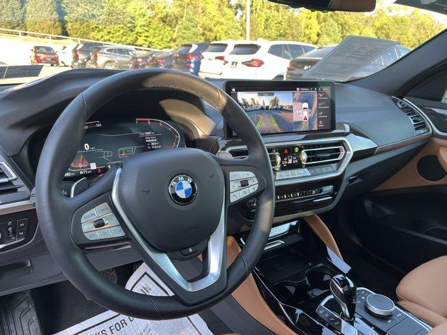 used 2025 BMW X4 car, priced at $52,999