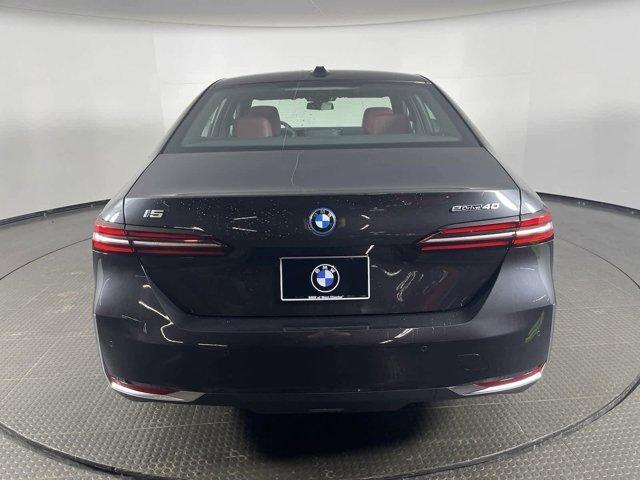 used 2024 BMW i5 car, priced at $57,880