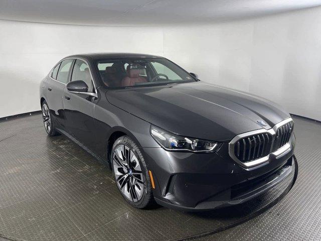 used 2024 BMW i5 car, priced at $57,880