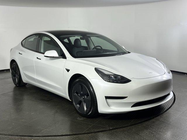 used 2022 Tesla Model 3 car, priced at $26,555