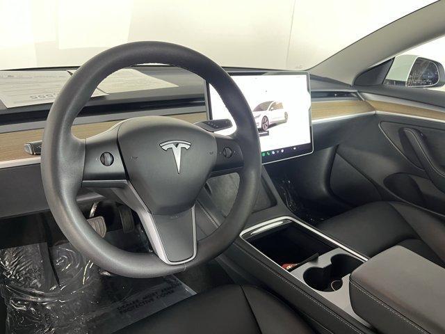 used 2022 Tesla Model 3 car, priced at $26,555