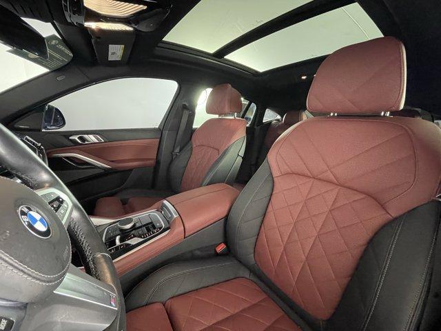 used 2024 BMW X6 car, priced at $70,663