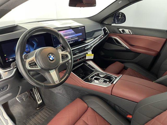 used 2024 BMW X6 car, priced at $70,663